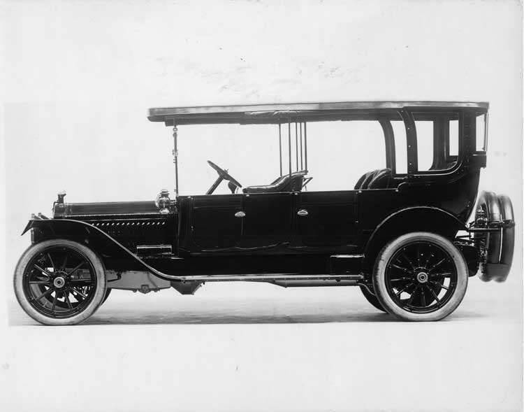 1913 Packard 48 touring car, left side, spare tires carried at back