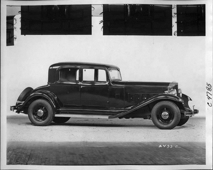1933 Packard coupe, nine-tenths right side view, top raised