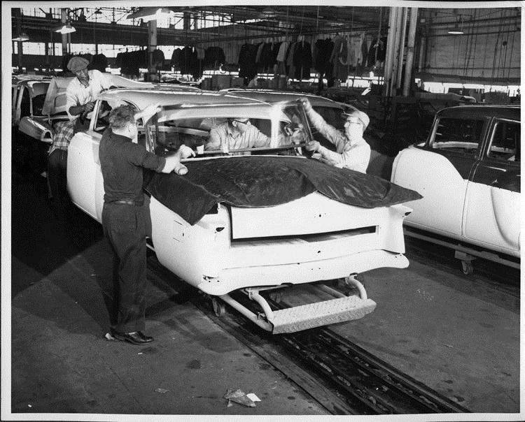 1955 Packard Clipper on assembly line, rear view