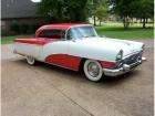 1955 Constellation Red White Front Passenger Side