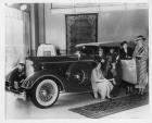 1934 PACKARD V12 CONV VICTORIA IN DEALER SHOWROOM WITH WOMEN PRESS PHOTO-B&W
