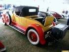 Packard 1928 443 rdstr YlwOrn lsvr