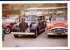 1939 Touring Sedan parked next to the 1953 Caribbean "The Scarlet Lady" 