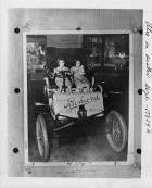 1901 Packard Model C on display, with young girls