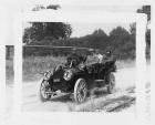1909 Packard 30 Model UB with five male passengers on country road