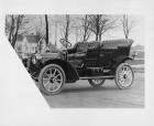 1909 Packard 18 Model NA touring car on residential street, left side view