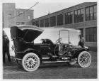 1909 Packard 30 Model UB touring car, right side, brick factory building in background