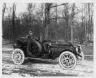1912 Packard 6 runabout driven by Henry Joy on a snowy, country road