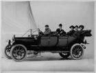 1913 Packard 48 touring car, male driver, male and female passengers
