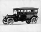 1914 Packard 48 touring car, left side, top raised, curtains closed