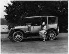 1916 Packard 1-25 two-toned limousine, Anna Held and her dog stepping into rear