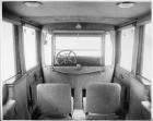 1917 Packard limousine, view of interior from rear seat, shown with forward auxiliary seats in place