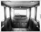 1917 Packard limousine, view of interior from rear seat, shown with forward auxiliary seats folded
