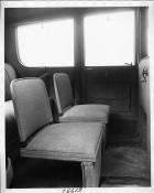 1917 Packard limousine, view of rear interior from side door, showing side-folding auxiliary seats