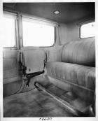 1917 Packard brougham, view of rear interior from right side door, showing side auxiliary seat folde