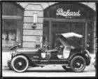 1917 Packard special victoria, parked on street in front of Packard dealership