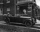 1918 Packard phaeton, parked in driveway of large brick home