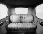 1918-1919 Packard limousine, view of rear interior from front, with pillow on back seat