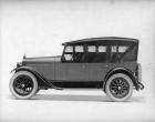 1921-1922 Packard two-toned touring car, top raised, storm curtains in place