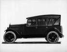 1921-1922 Packard touring car, left side view, top raised, storm curtains in place