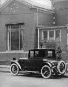 1921-1922 Packard coupe, parked on street in front of Frank Scott Clark Studio