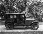 1921-1922 Packard sedan, parked in drive, right side view, doors open to reveal interior