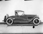 1923 Packard runabout, right side view, top raised, rumble seat open