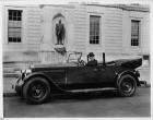 1925-1926 Packard touring car parked on street with New Hampshire governor, John G. Winant
