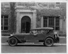 1925-1926 Packard sport model parked in front of Packard building, General Billy Mitchell driver
