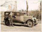1927 Packard sedan, owner N.S. Murphey of Milwaukee standing at passenger door