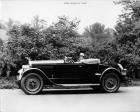 1927 Packard runabout, right side view, top lowered, owner Miss Marjorie Dork behind wheel