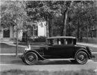 1927 Packard coupe, right side view, parked on residential street