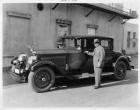 1927 Packard coupe, three-quarter left front view, owner Louis B. Mayer standing at driver's door