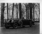 1928 Packard special dual cowl & windshield phaeton, male behind wheel