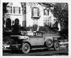 1928 Packard convertible sedan, four-fifths right rear view, parked on residential street