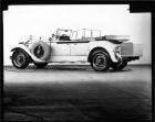 1928 Packard phaeton, three-quarter left rear view, top lowered