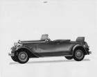 1930 Packard roadster, left side view, top folded, rumble seat open