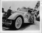 1934 Packard coupe roadster, blonde woman in bathing suit at driver's door