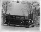 1934 Packard funeral coach at gate to Packard Proving Grounds