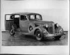 1935 Packard sedan, three-quarter right front view, rear passenger door open