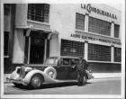 1935 Packard limousine parked in front of La Consolidada S.A.