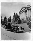 1936 Packard club sedan, parked on street in front of Utah state Capitol Building