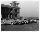 1937 Packard business coupes, lined up in front of Belle Isle Casino