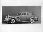 1937 Packard touring sedan, seven-eights left side view,