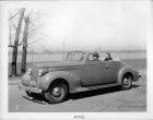 1938 Packard convertible coupe in front of the Detroit River on Belle Isle