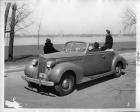 1938 Packard convertible coupe parked by Detroit River on Belle Isle