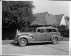 1938 Packard touring sedan, left side view, at Packard Proving Grounds