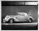 1938 Packard coupe roadster, nine-tenths left side view, top raised, rumble seat open