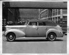 1940 Packard convertible sedan, left side view, top raised
