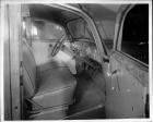 1940 Packard station wagon, view of front interior through passenger side door